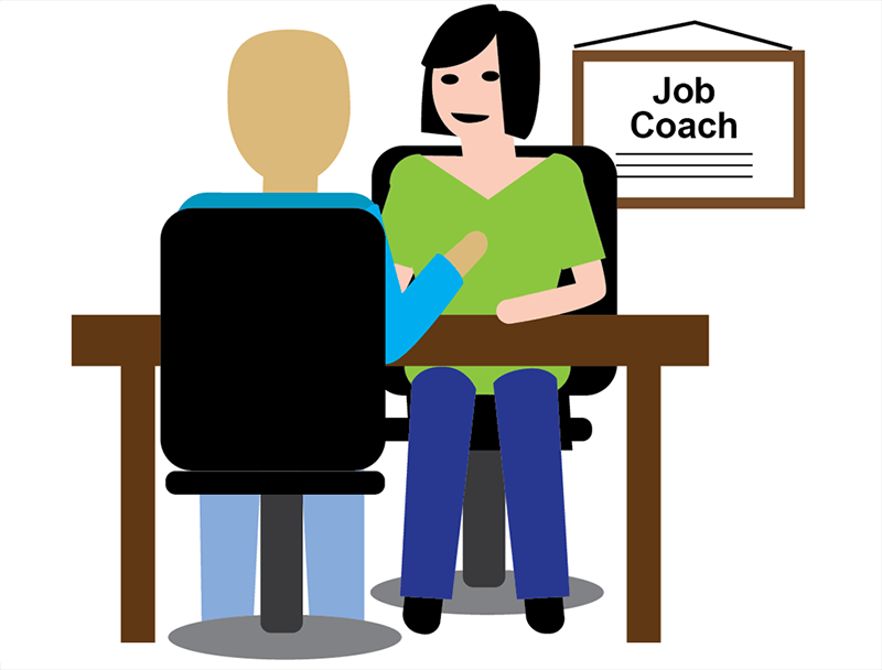 person sitting and talking to a job coach